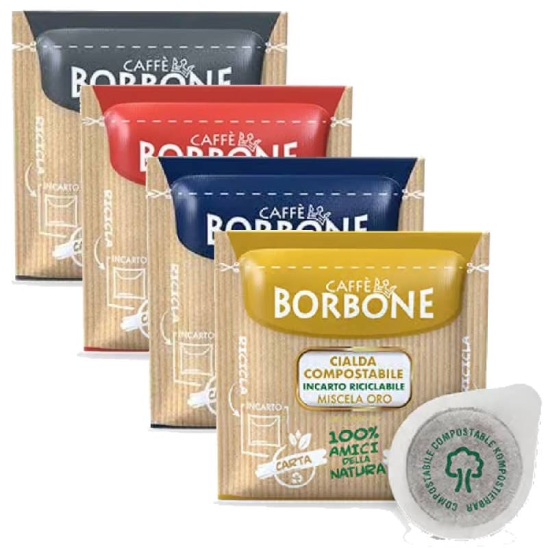 Vier Packungen kompostierbarer Caffè Borbone E.S.E. Pads (Miscela Nera, Rossa, Blu und Oro) mit einem E.S.E. Pad im Vordergrund